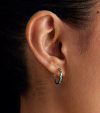 Astrid & Miyu white gold and emerald baguette hoop earrings, imported from the UK