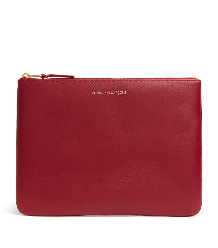 Comme des Garçons large leather zipped pouch - British product