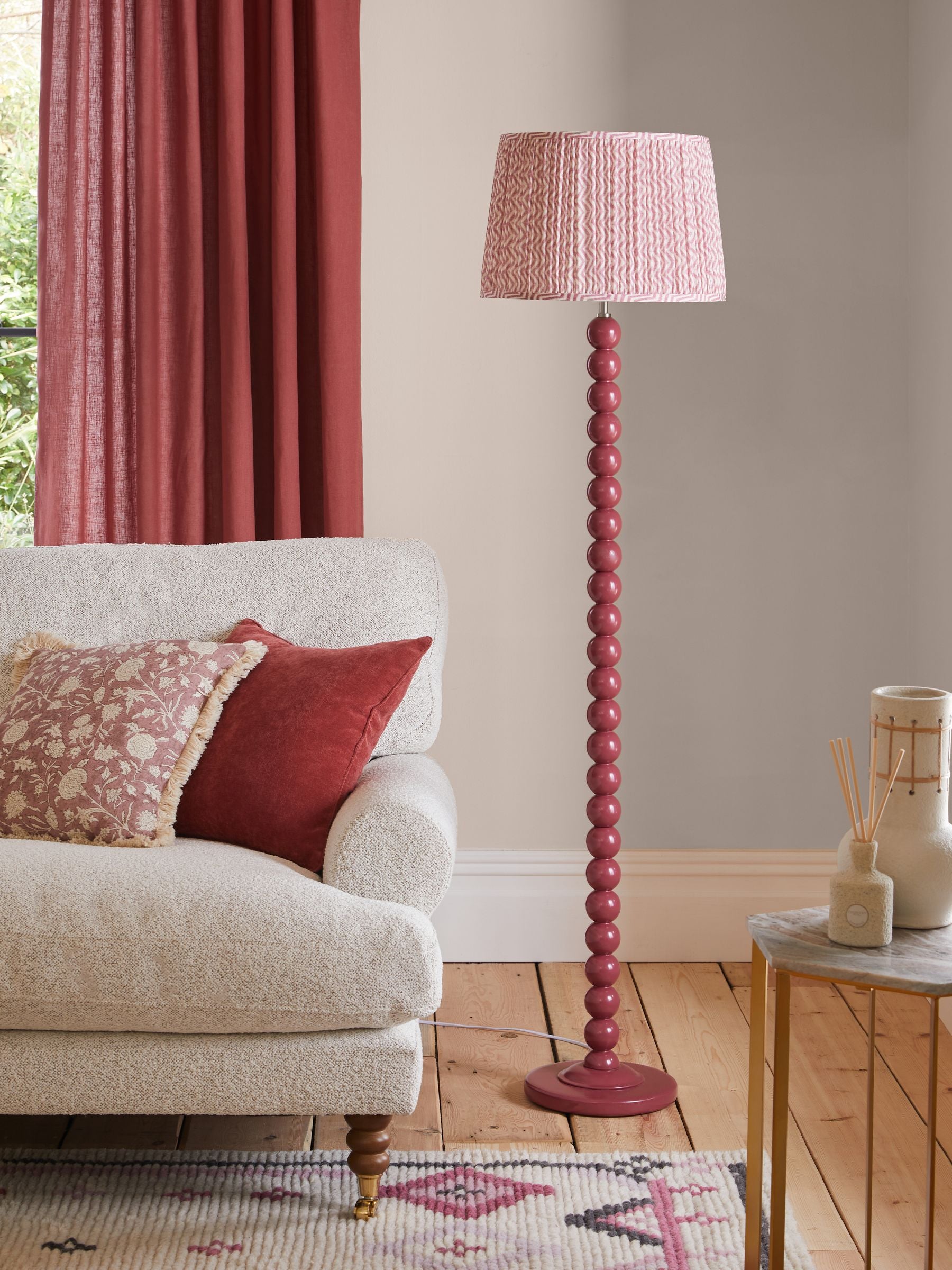 Red Bobbin floor lamp with painted wood effect and fabric shade, UK version