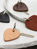 Handmade personalised leather plectrum keyring in four colour options, UK version
