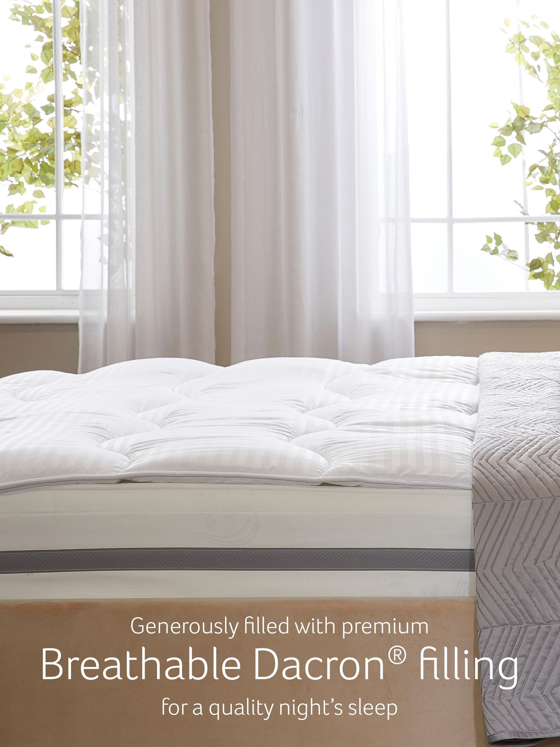 Snuggledown white mattress topper (British brand)