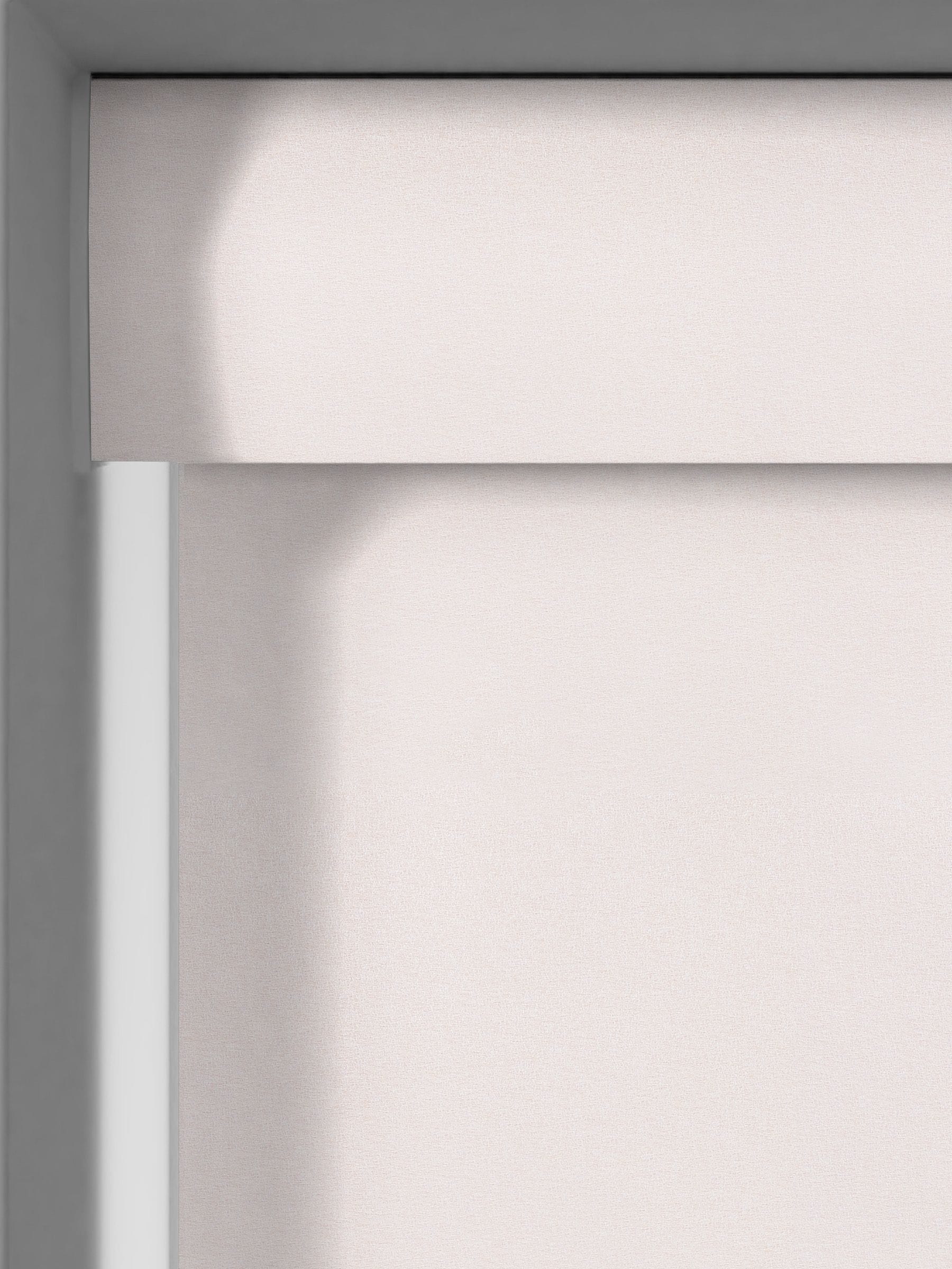 Blush pink Sammi blackout roller blind, imported from the UK