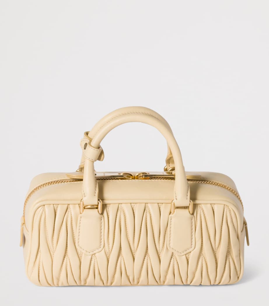 Miu Miu Arcadie matelassé leather top-handle bag, imported from the UK