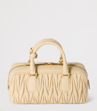 Miu Miu Arcadie matelassé leather top-handle bag, imported from the UK