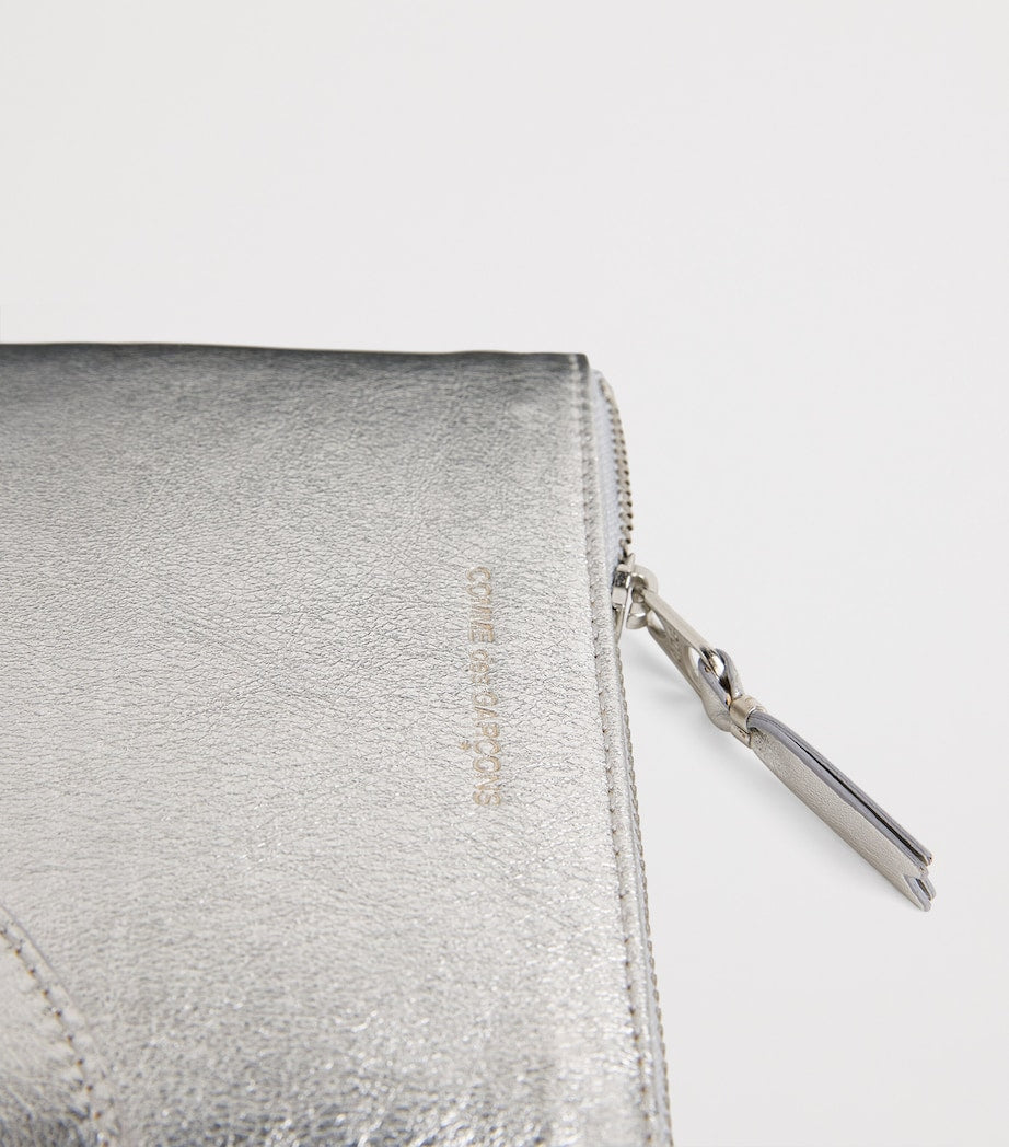 Comme Des Garçons Wallet small leather pouch silver, UK version