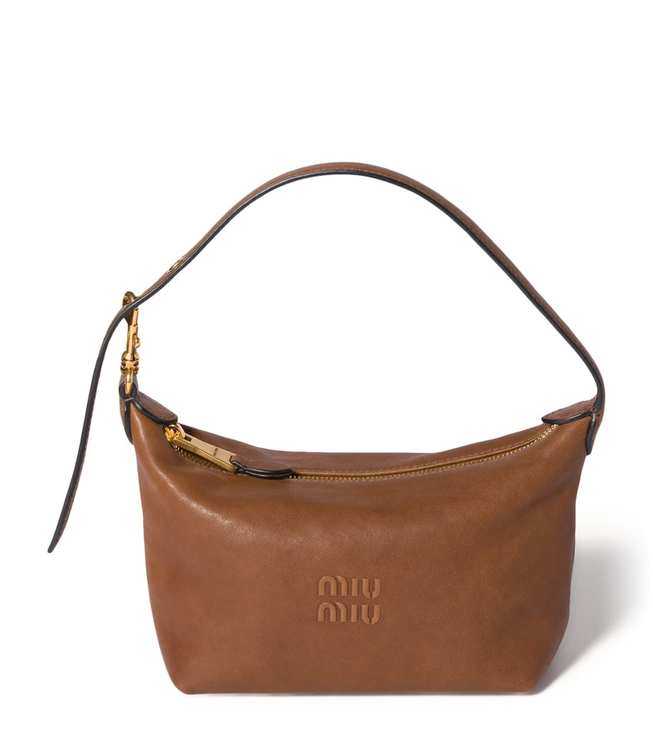 Miu Miu Nappa leather pouch with wrist strap (British brand)