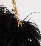 Balmain Anthem clutch bag with long fibres and gold buckle, imported from the UK