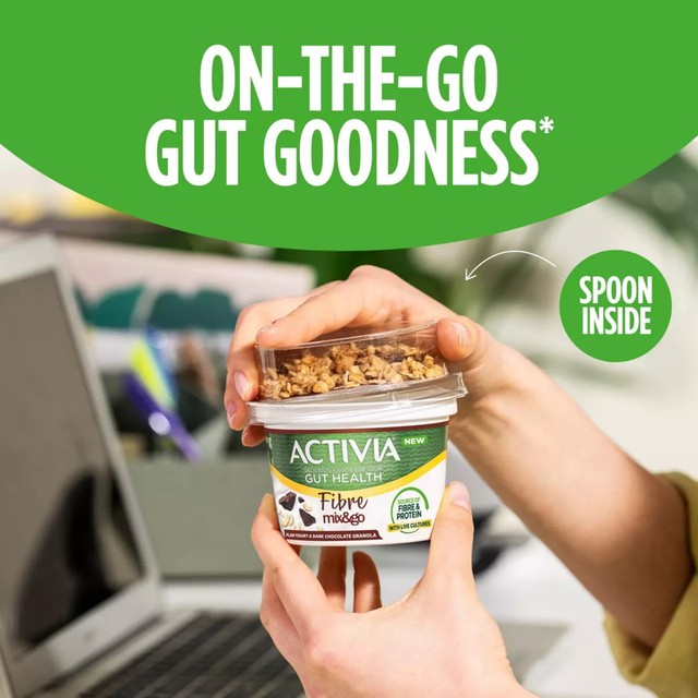 Activia Fibre yogurt dark chocolate granola pot with spoon, imported from the UK