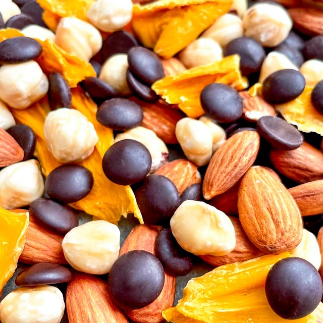 Nibble Simply Choccy Hazelnut Mango trail mix 32g, imported from the UK