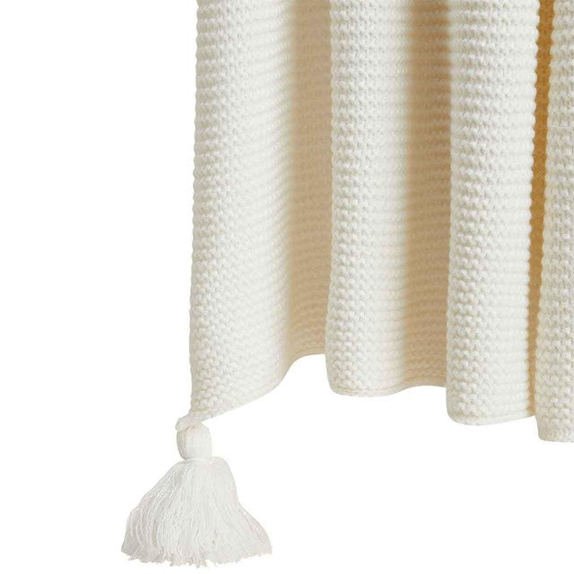 M&S Knitted Tassel Throw in Cream, imported from the UK