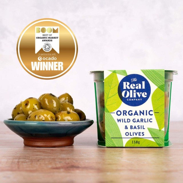The Real Olive Co. Organic Wild Garlic & Basil Pitted Olives 150g, imported from the UK