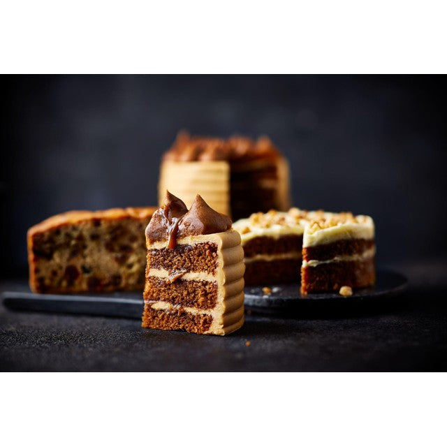 M&S Iced Madeira Cake with vanilla buttercream and raspberry jam 310g, imported from the UK