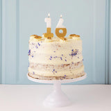 Talking Tables number 6 large gold candle (British brand)