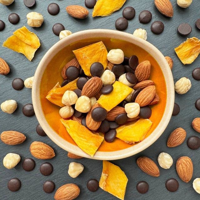 Nibble Simply Choccy Hazelnut Mango trail mix 32g, imported from the UK