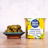The Real Olive Co organic lemon thyme black pepper olives, UK version