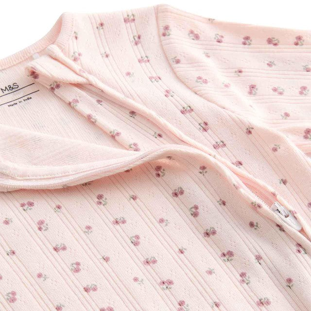 M&S baby sleepsuit in pale blush 12-18 months, imported from the UK