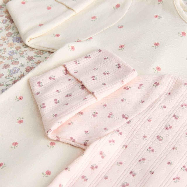 M&S baby sleepsuit in pale blush 12-18 months, imported from the UK