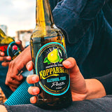 Sidra de pera sin alcohol Kopparberg, botella de vidrio de 500 ml, versión para el Reino Unido.