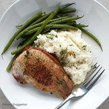 Ocado bone-in pork chops 500g, imported from the UK