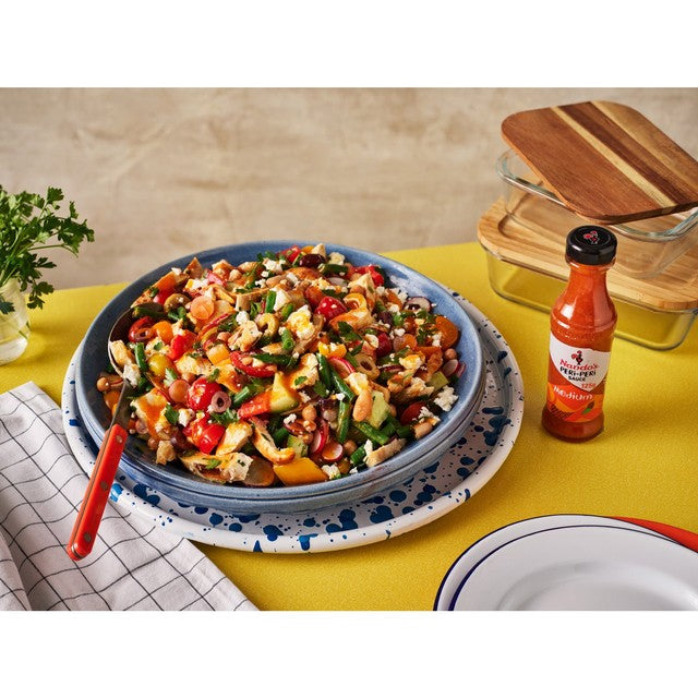 Nando's Medium Peri-Peri Sauce 125g, imported from the UK