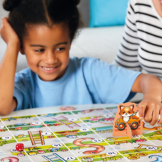 Orchard Toys Snakes and Ladders board game, imported from the UK