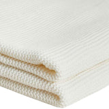M&S Knitted Tassel Throw in Cream, imported from the UK