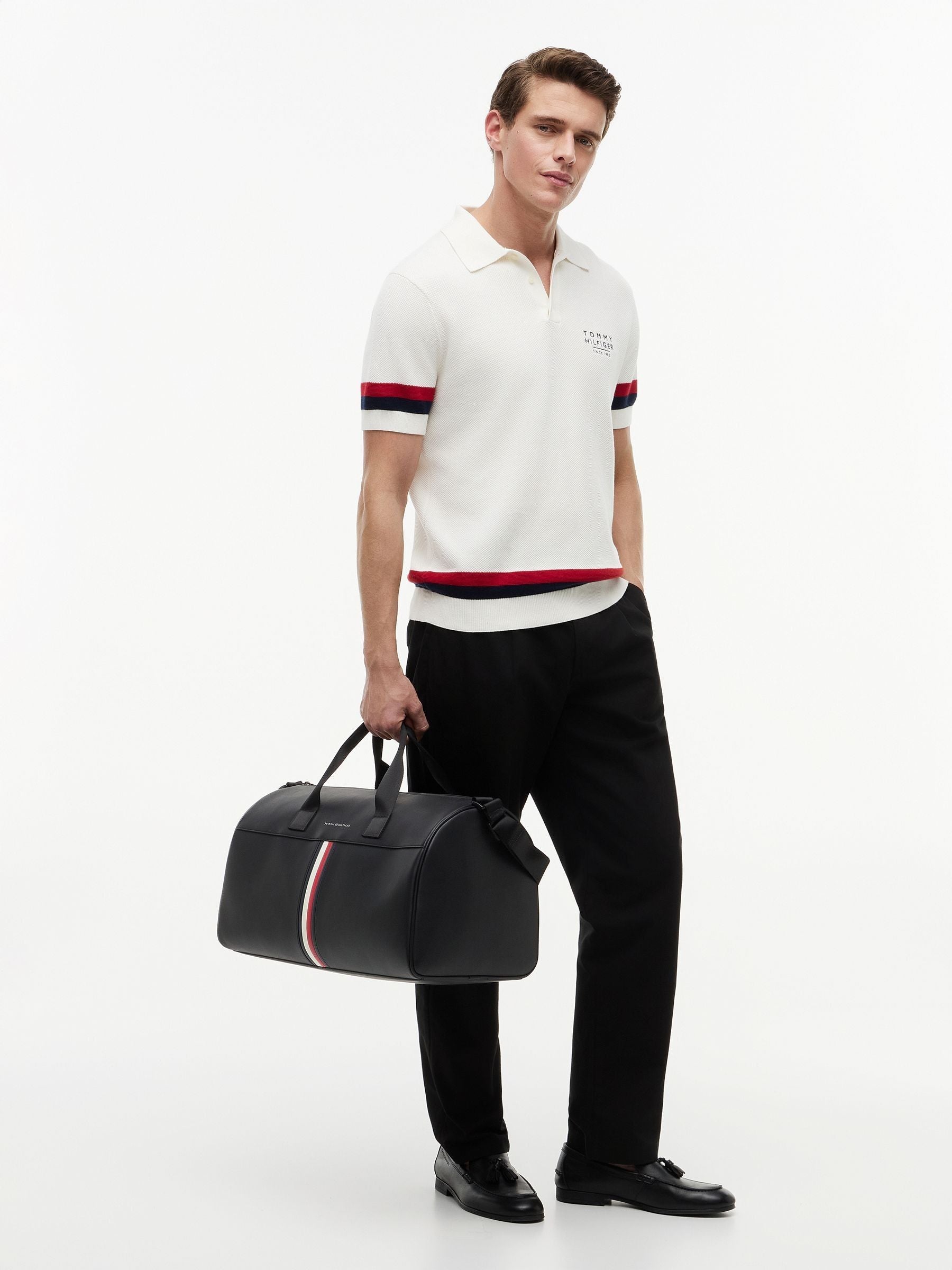 Tommy Hilfiger black metallic logo signature tape duffel bag, UK version
