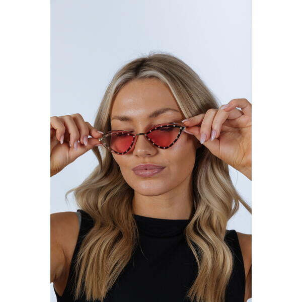 SVNX pink cat-eye sunglasses with gold frame, imported from the UK