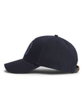 Tommy Hilfiger blue logo patch six-panel baseball cap, imported from the UK