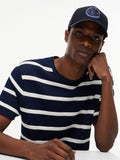 Tommy Hilfiger blue logo patch six-panel baseball cap, imported from the UK