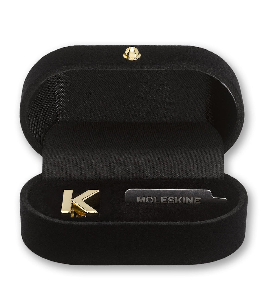 Moleskine gold-plated K notebook charm, imported from the UK