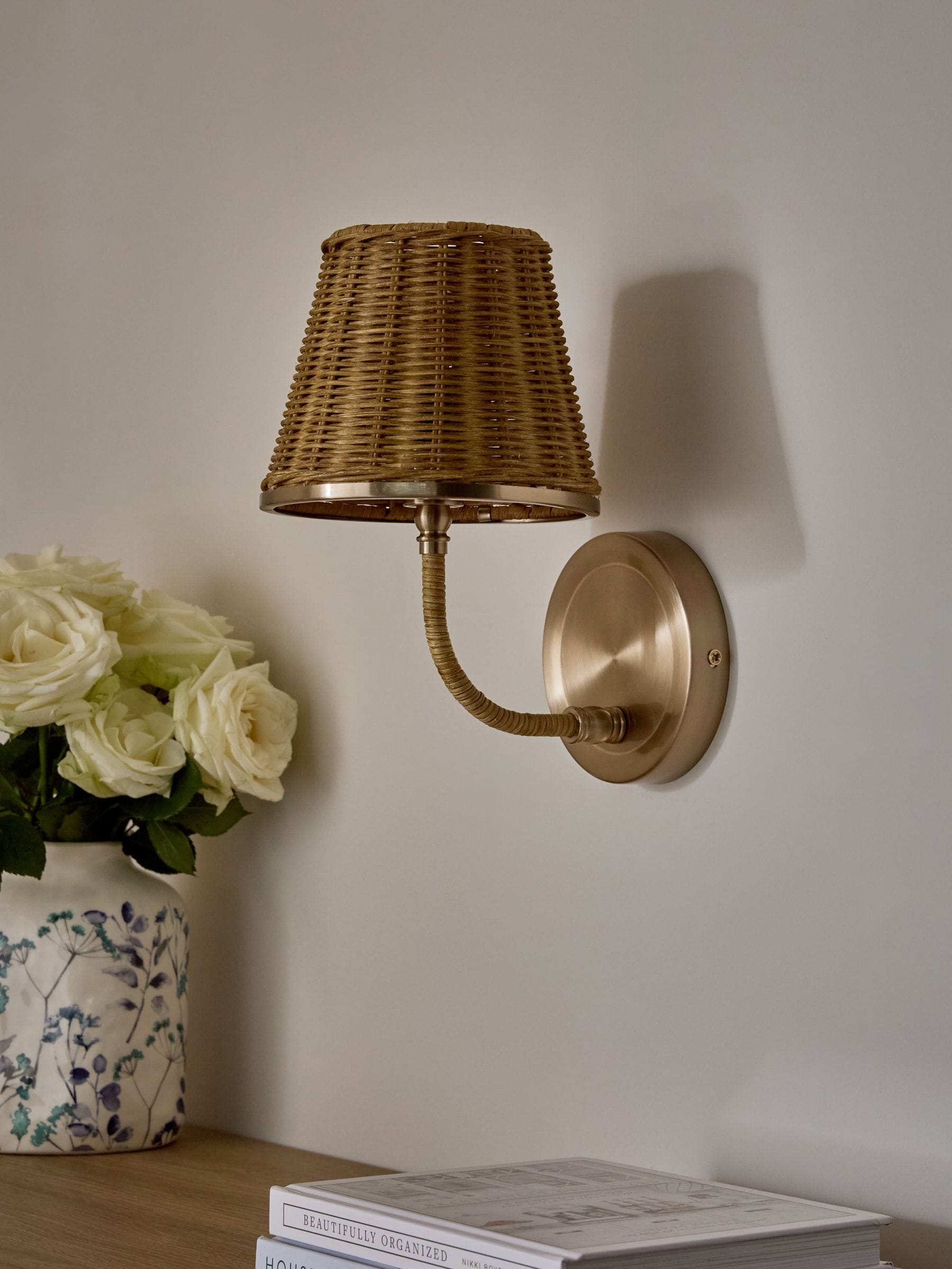 Brass Stratford woven rattan wall light (British brand)