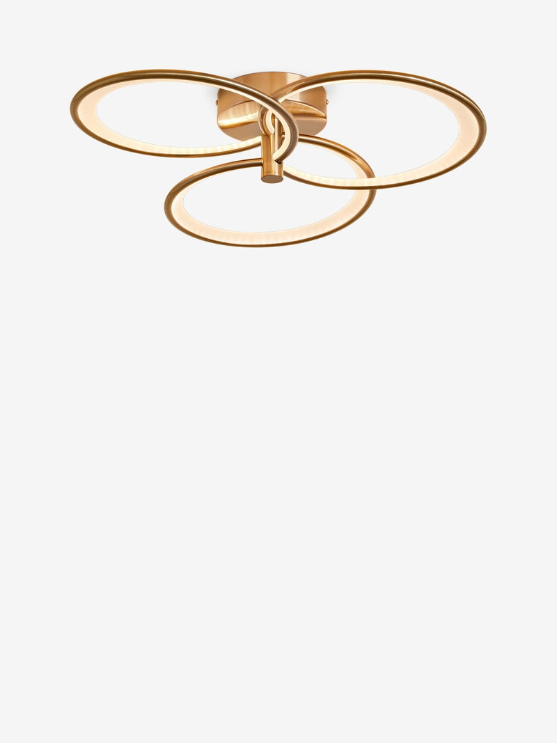 Raya flush ceiling light with brass finish and integrated LED (British brand)