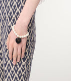 Valentino Garavani Coeur Royal beaded bracelet with heart pendant, imported from the UK