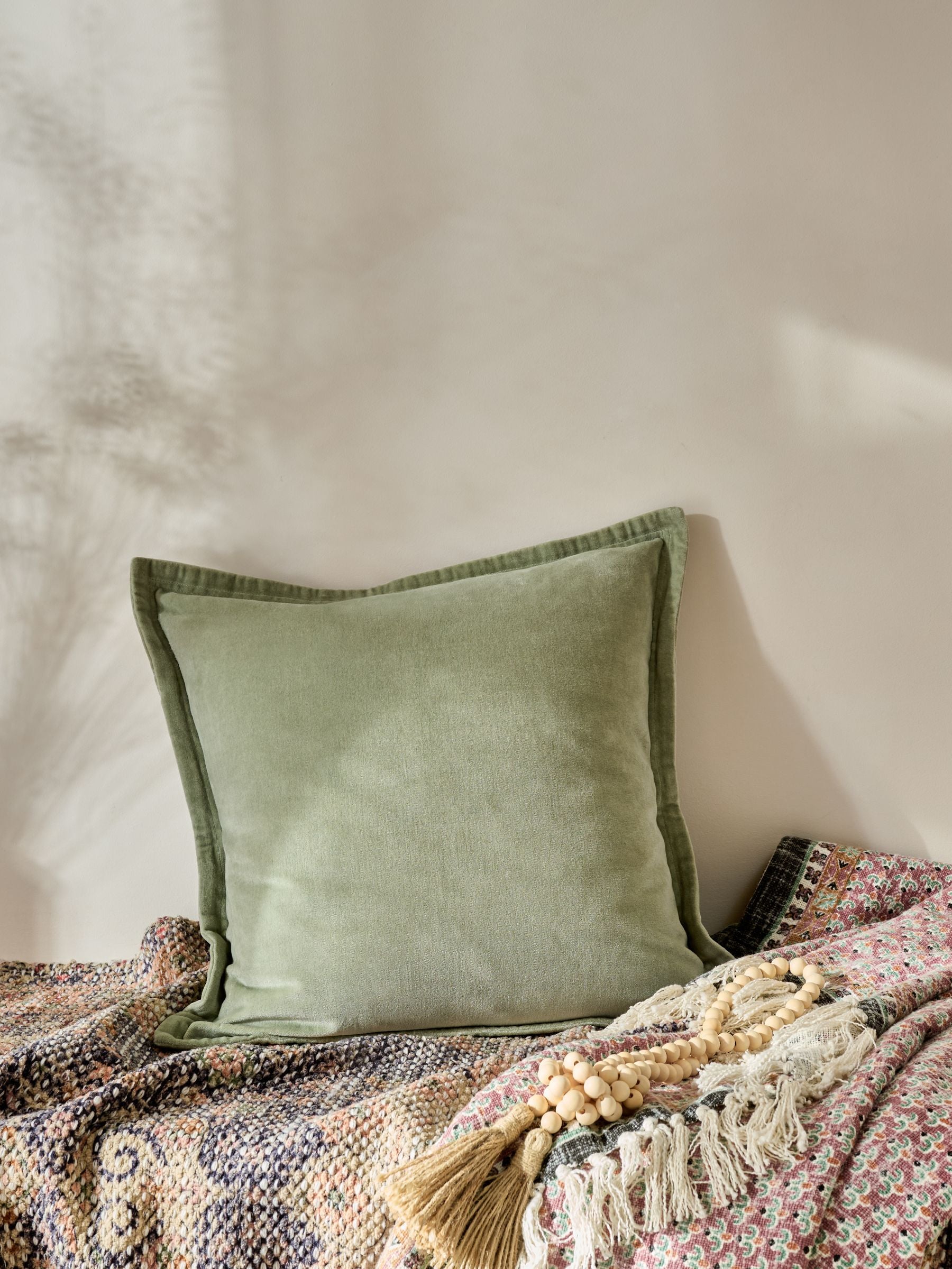 French Connection sage green washed velvet cushion, imported from the UK