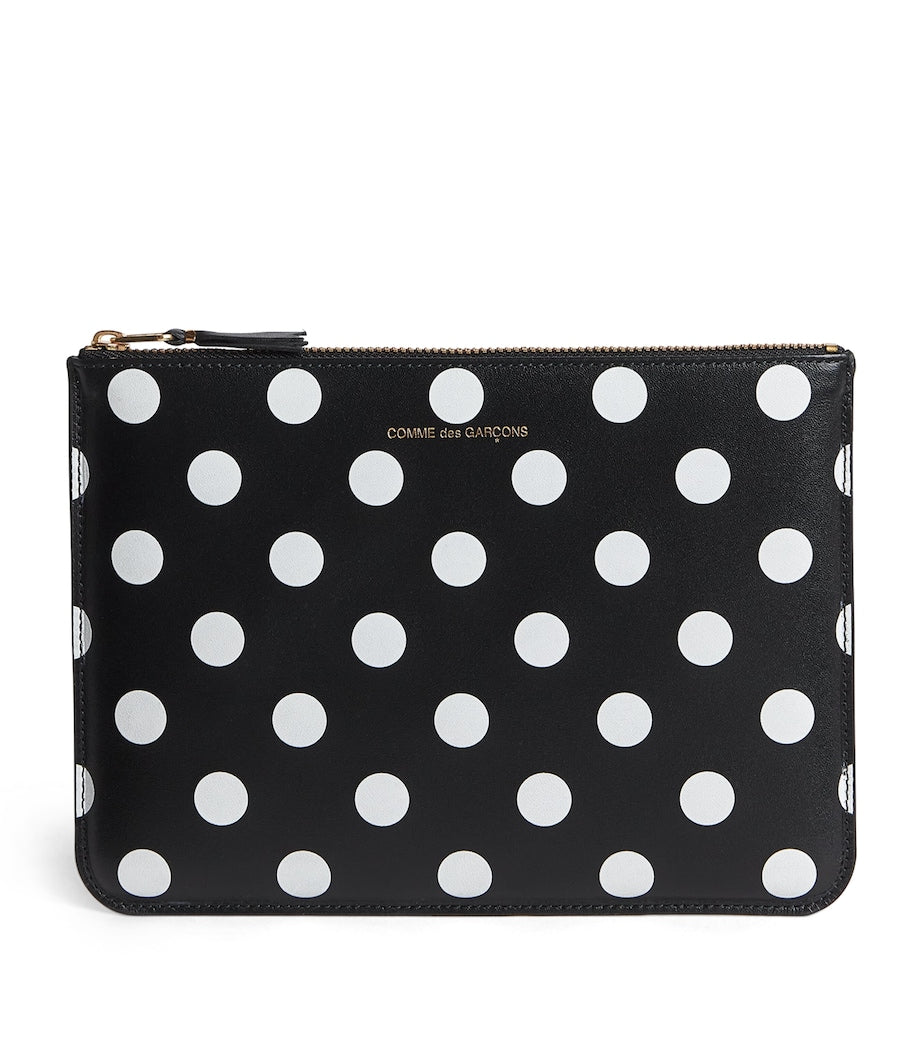 Comme Des Garçons large leather polka-dot zipped pouch, imported from the UK