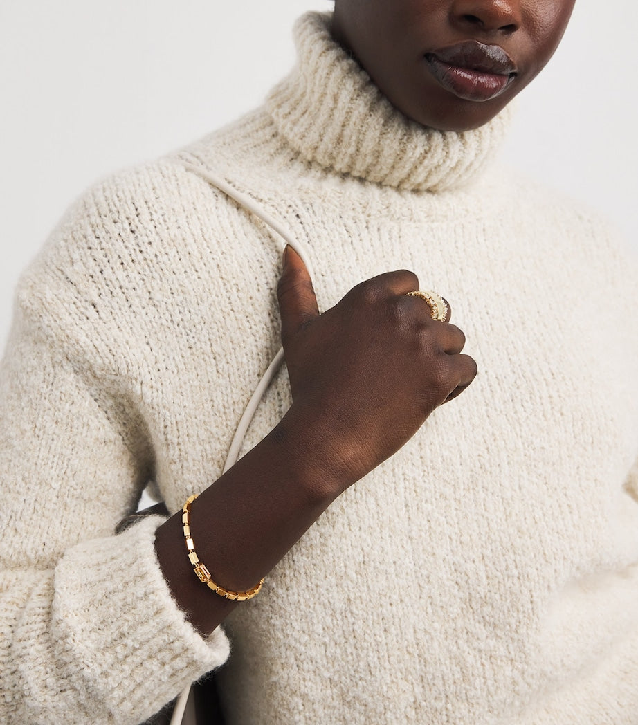 Suzanne Kalan block chain bracelet with pastel sapphires, imported from the UK