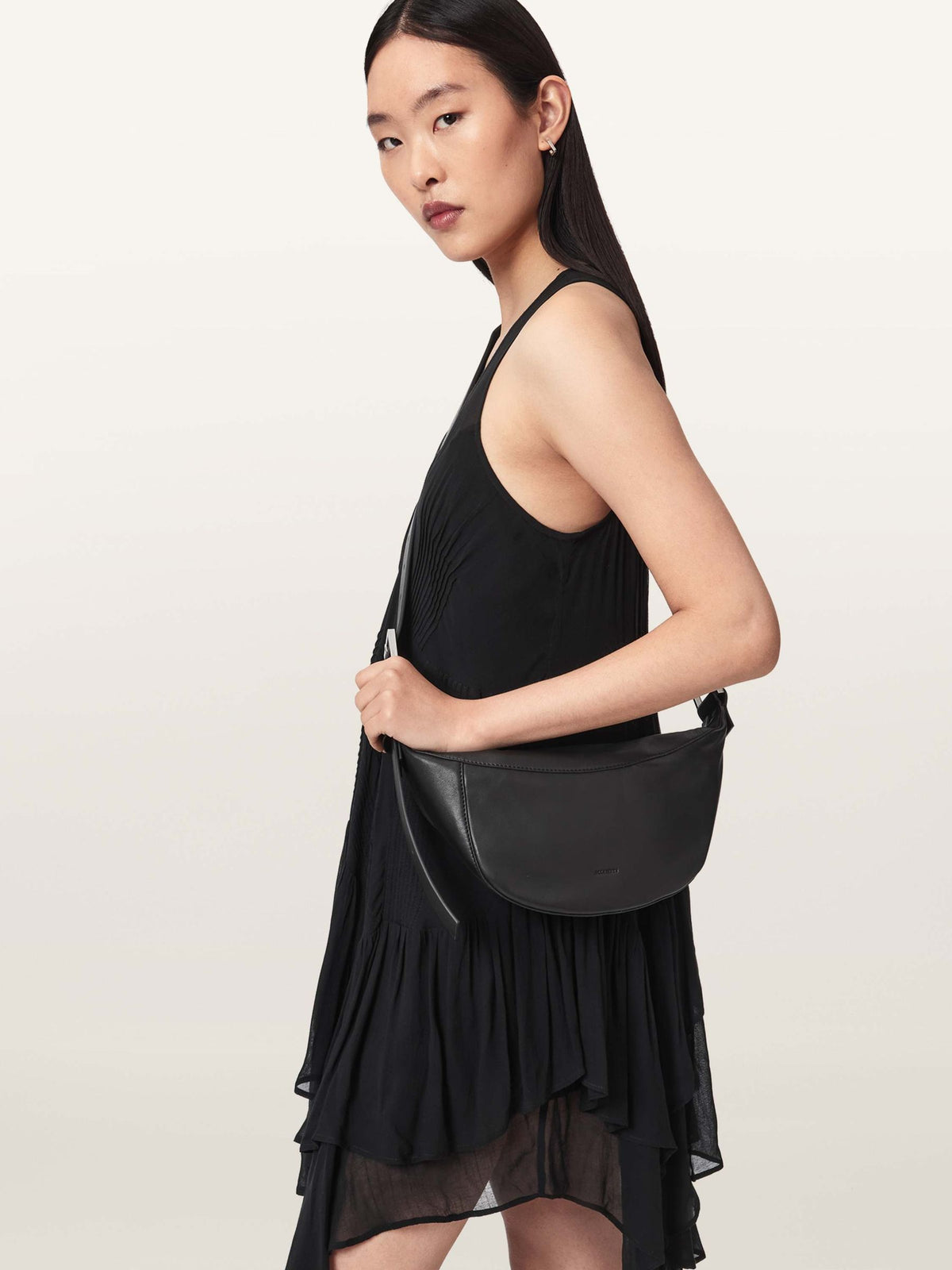 AllSaints Black Luna leather cross-body bag, UK version