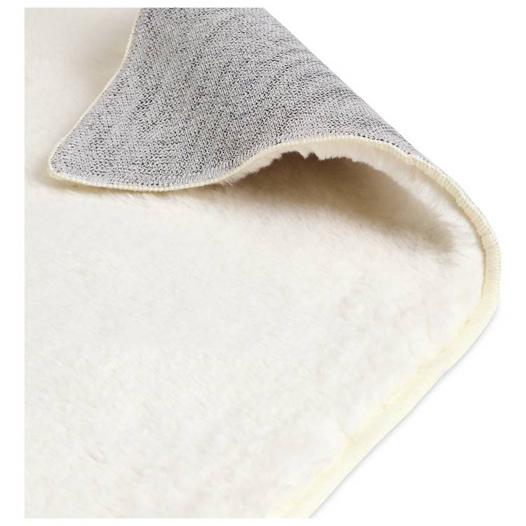 Habitat faux fur cream short pile rug 80x150cm, imported from the UK