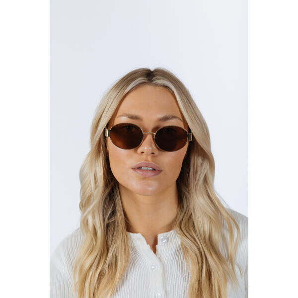 SVNX rounded oval metal frame sunglasses in gold brown, imported from the UK