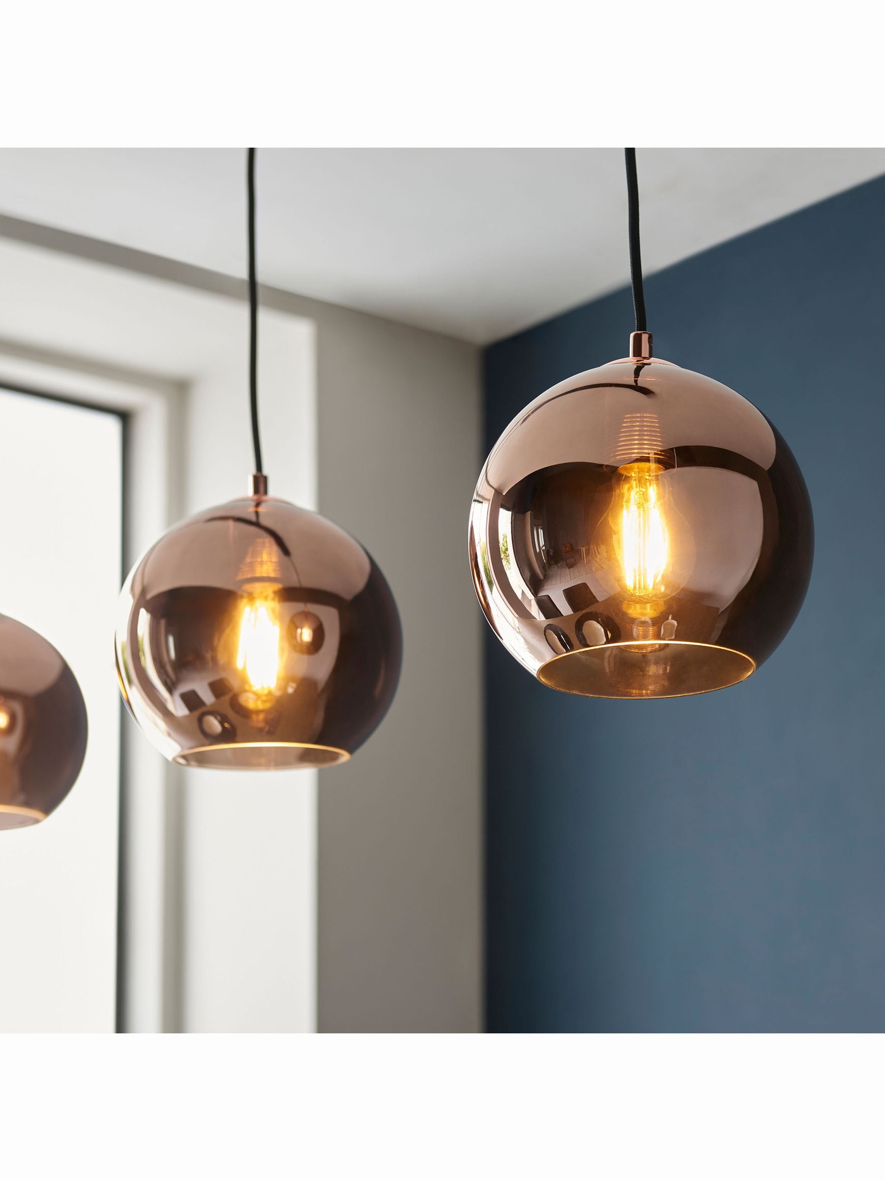 Gallery Home Copper Bali pendant light mirrored glass shades, imported from the UK