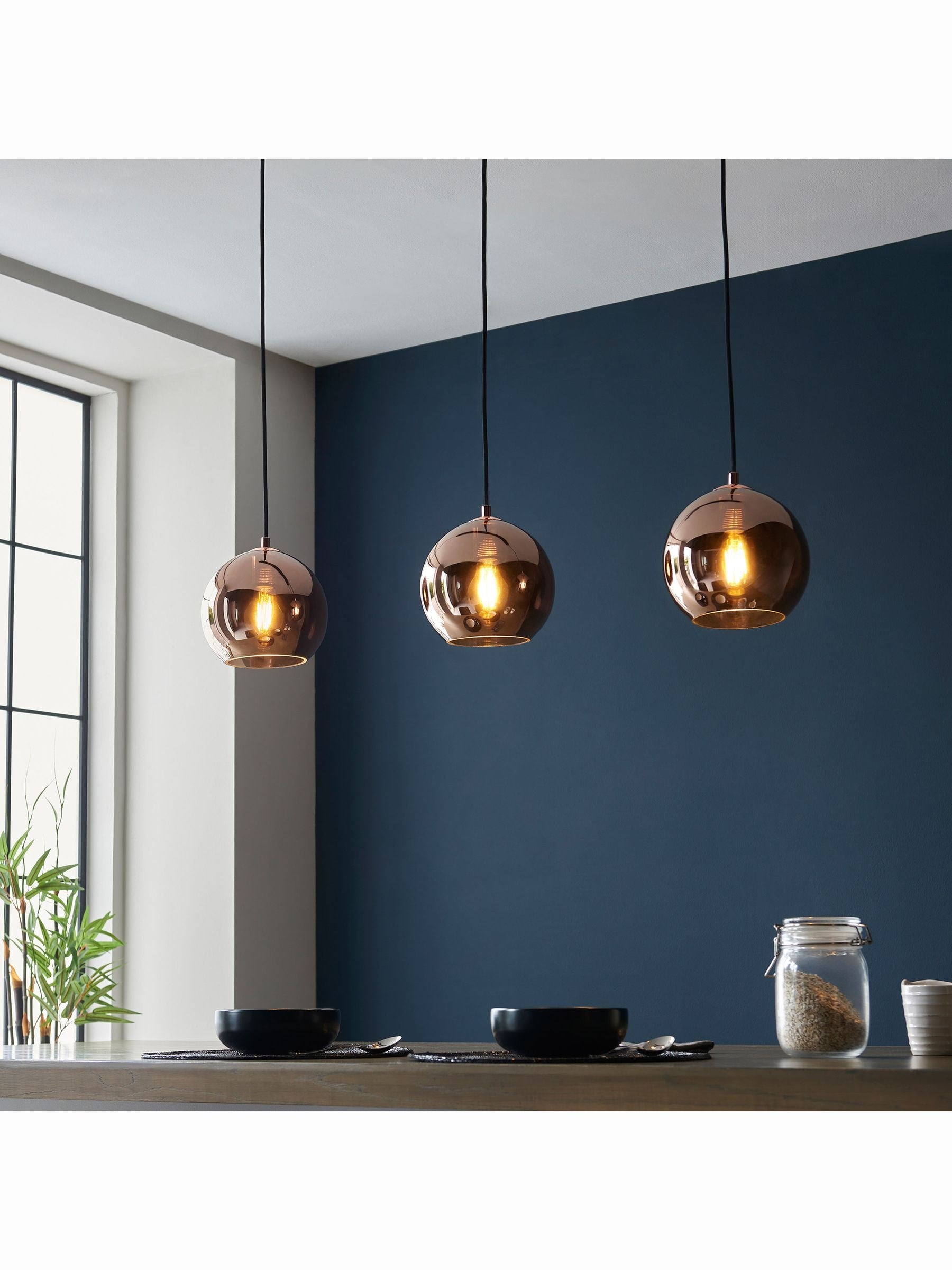 Gallery Home Copper Bali pendant light mirrored glass shades, imported from the UK