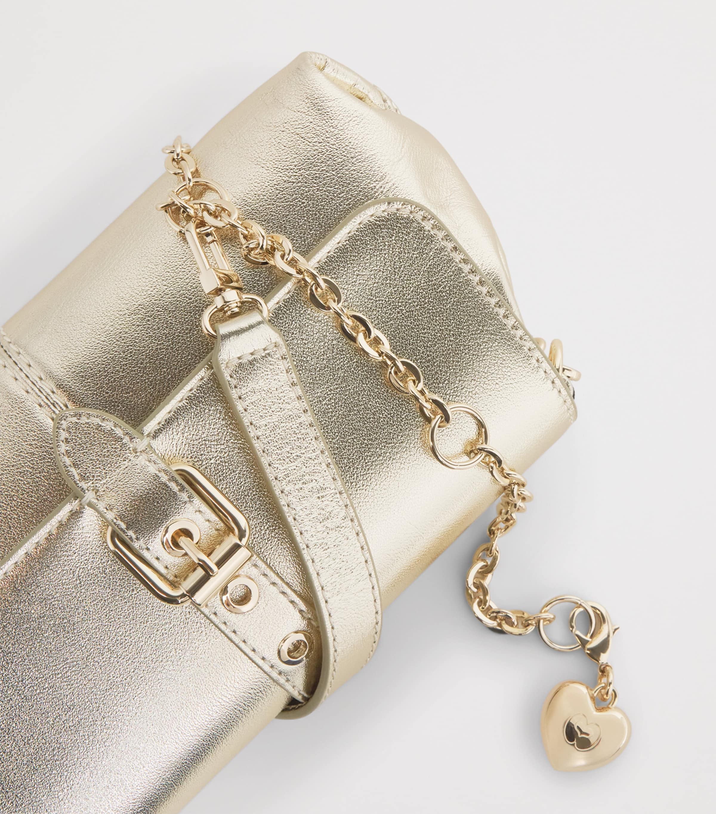 Maje metallic leather Miss M clutch bag with gold buckle, imported from the UK