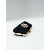SVNX black ruched clutch bag with chain strap, UK version