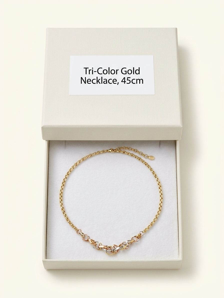 Cartier Trinity necklace tri-colour 18ct gold, imported from the UK