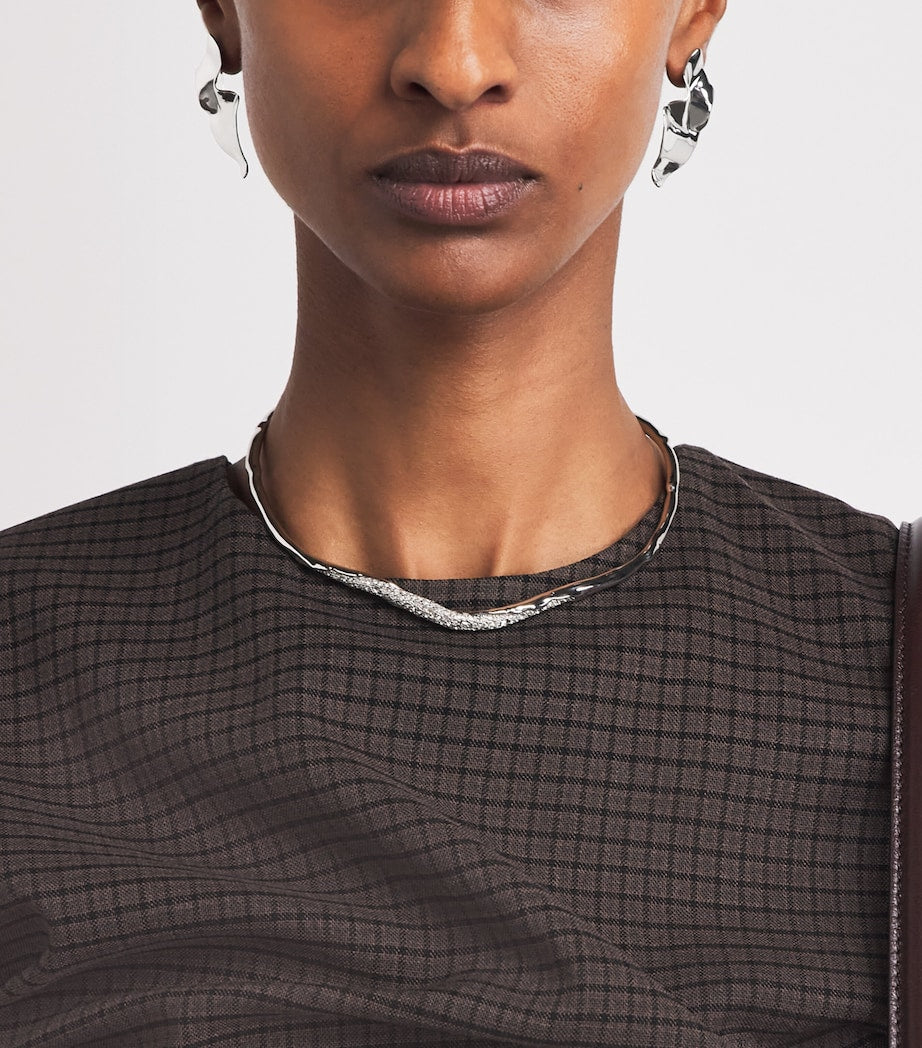 Alexis Bittar small crumpled earrings in rhodium plated brass, imported from the UK