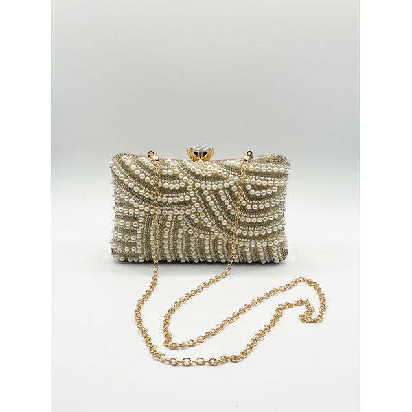 SVNX gold pearl embellished clutch bag, UK version