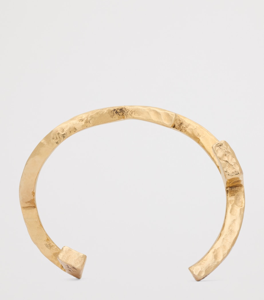 Saint Laurent cuff bracelet hammered Cassandre - British product