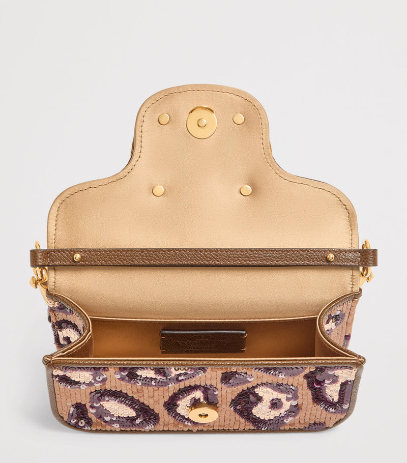 Valentino Garavani small embellished Locò shoulder bag, imported from the UK