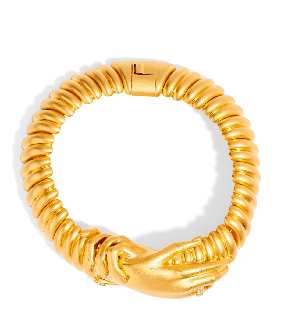 Schiaparelli Hand in Hand necklace, imported from the UK
